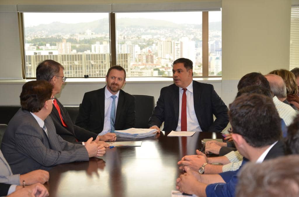 Daniel Martini e Marcelo Dornelles (ao centro)