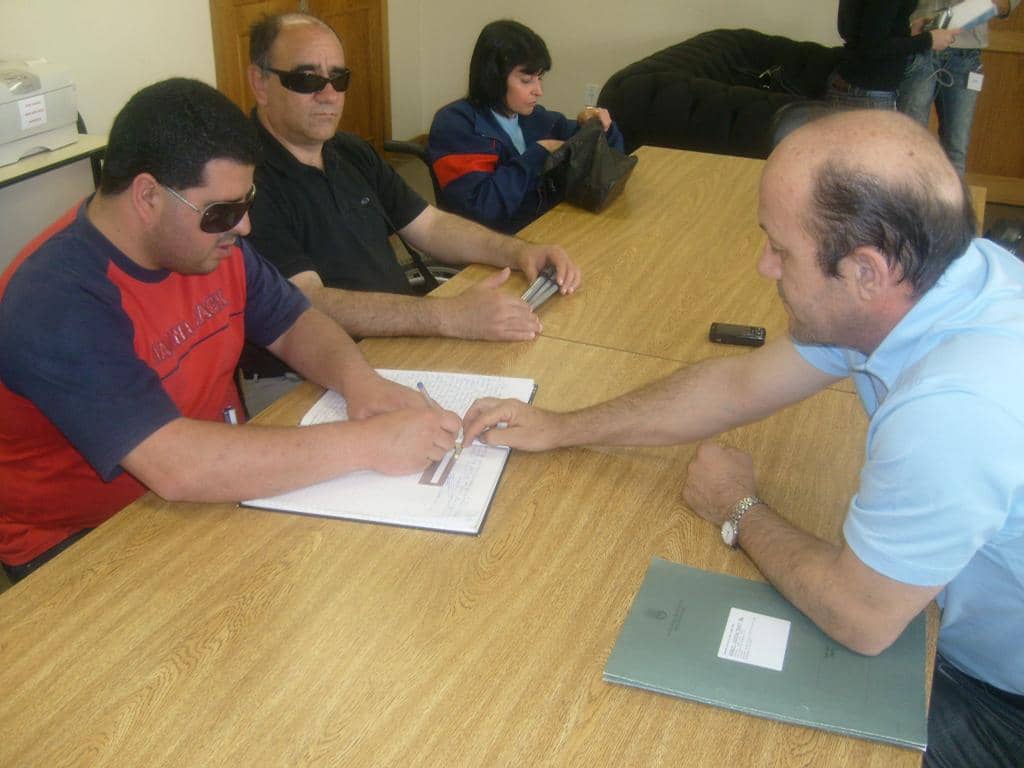 Promotor Edgar (à direita) durante reunião