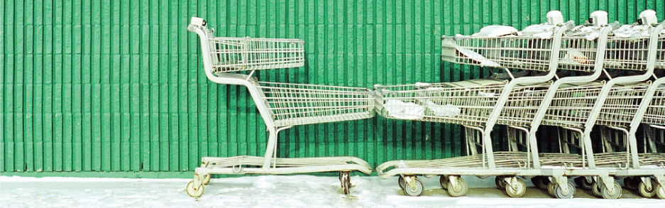 Imagem de cabeçalho com vários carrinhos de supermercado